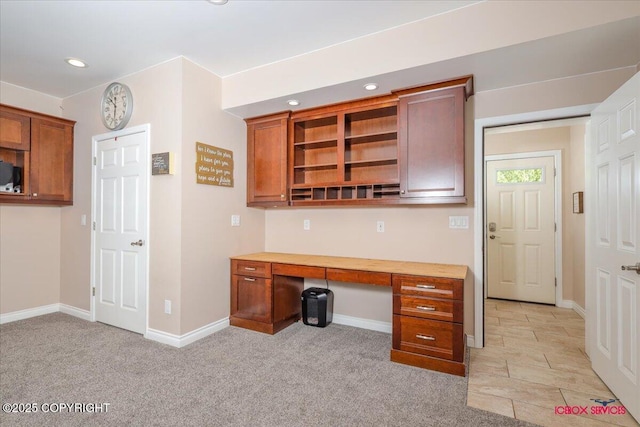 2750 E Whispering Woods Dr, Wasilla, AK 99654 - kitchen with baseboards, recessed lighting, open shelves, light colored carpet, and brown cabinets