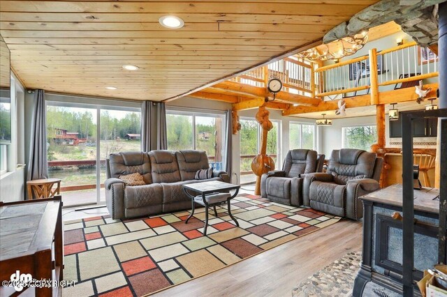 living room with wood ceiling, wood finished floors, a chandelier, and recessed lighting