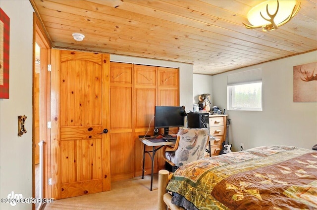 bedroom with carpet flooring and wooden ceiling