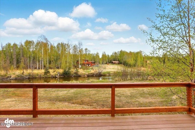 deck featuring a water view