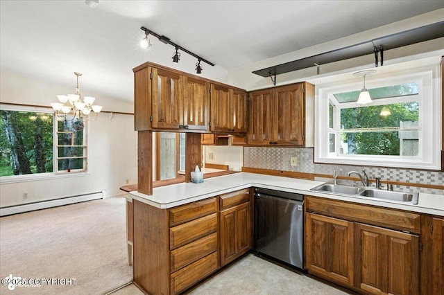 3337 Madison Way, Anchorage, AK 99508 - kitchen with stainless steel dishwasher, a baseboard heating unit, light countertops, and brown cabinetry