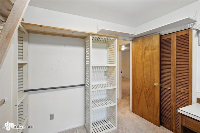 3337 Madison Way, Anchorage, AK 99508 - walk in closet featuring carpet