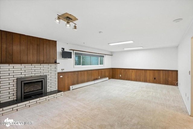 3337 Madison Way, Anchorage, AK 99508 - unfurnished living room with a baseboard radiator, carpet, wood walls, and a fireplace