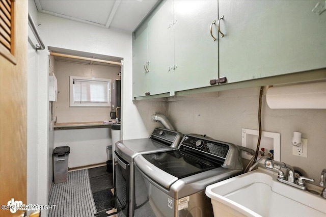 3337 Madison Way, Anchorage, AK 99508 - laundry room with cabinet space and separate washer and dryer