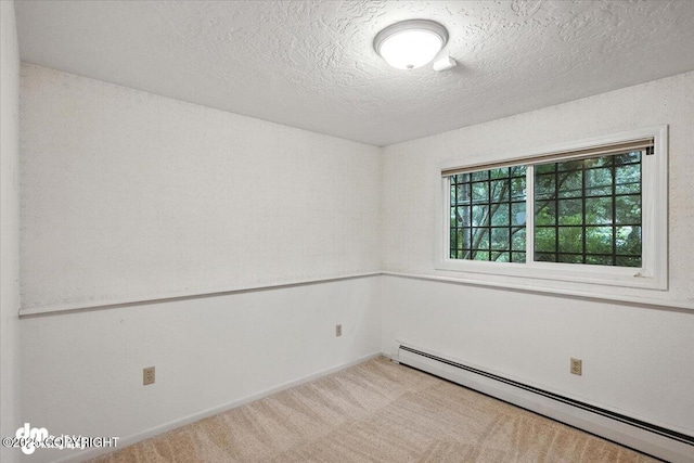 3337 Madison Way, Anchorage, AK 99508 - unfurnished room with a baseboard heating unit, light colored carpet, and a textured ceiling