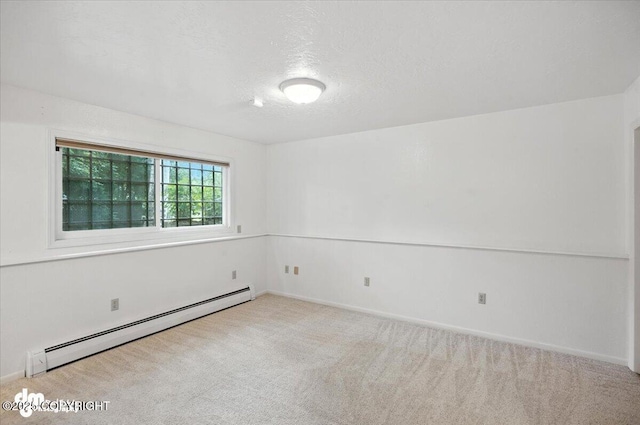 3337 Madison Way, Anchorage, AK 99508 - spare room with a baseboard heating unit, carpet, and a textured ceiling