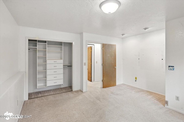 3337 Madison Way, Anchorage, AK 99508 - unfurnished bedroom with carpet floors, a closet, and a textured ceiling