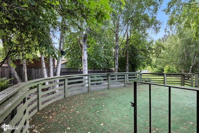 3337 Madison Way, Anchorage, AK 99508 - view of property's community with a fenced backyard