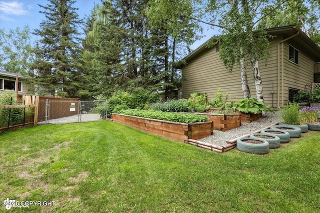 3337 Madison Way, Anchorage, AK 99508 - view of yard featuring a vegetable garden