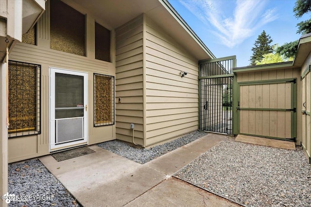 3337 Madison Way, Anchorage, AK 99508 - property entrance with a gate