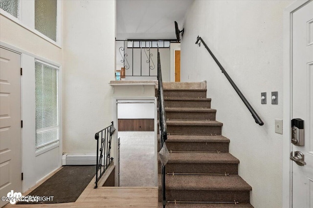 3337 Madison Way, Anchorage, AK 99508 - staircase with wood finished floors and baseboards