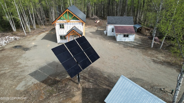 26155 W Long Lake Rd, Willow, AK 99688 - view of swimming pool featuring a forest view and an outbuilding
