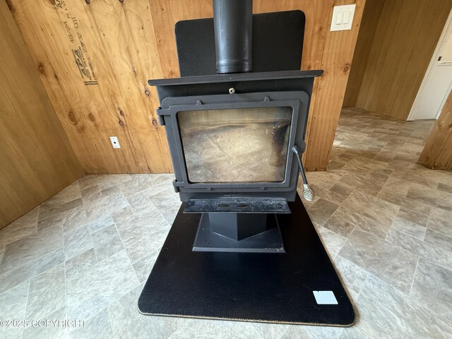 26155 W Long Lake Rd, Willow, AK 99688 - detailed view of a wood stove and wood walls