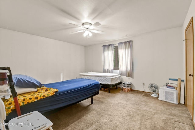 bedroom featuring carpet and a ceiling fan