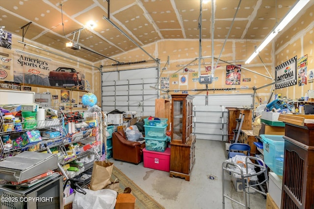 garage featuring a garage door opener