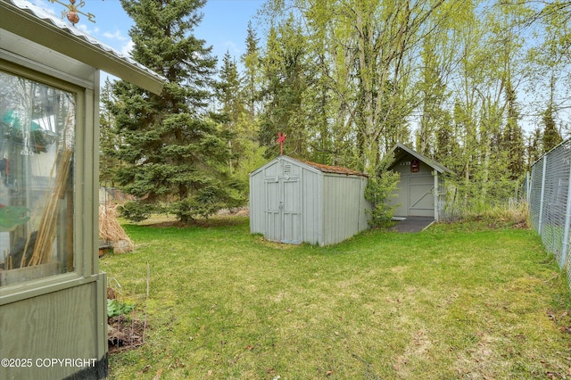 view of yard with a storage unit and an outdoor structure