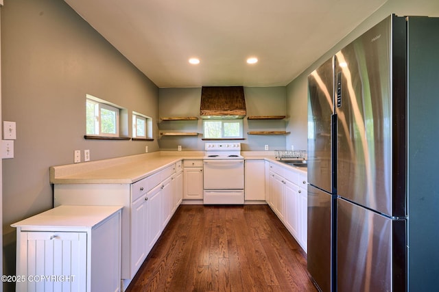 3625 W Hill Rd, Homer, AK 99603 - kitchen with stainless steel refrigerator, electric range, open shelves, custom exhaust hood, and dark wood-style flooring