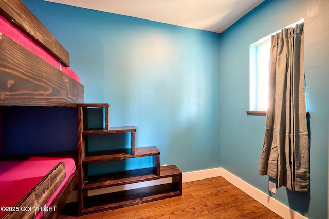 3625 W Hill Rd, Homer, AK 99603 - staircase featuring wood finished floors and baseboards