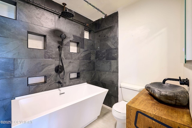 3625 W Hill Rd, Homer, AK 99603 - bathroom featuring toilet, a tub to relax in, a shower, and vanity