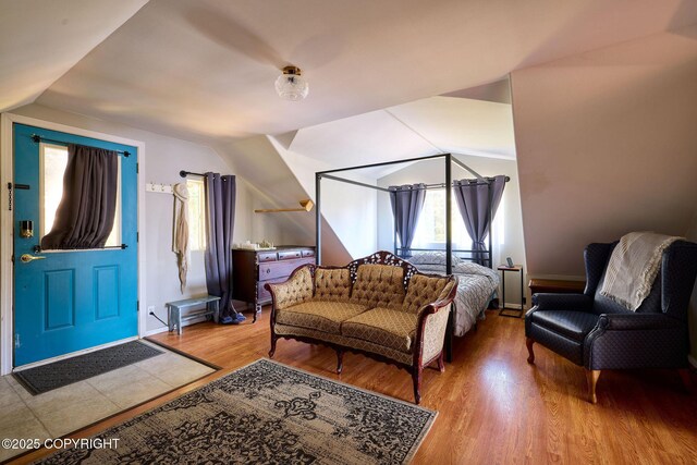 3625 W Hill Rd, Homer, AK 99603 - bedroom with vaulted ceiling and wood finished floors