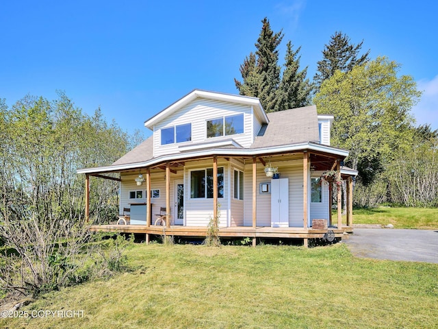 3625 W Hill Rd, Homer, AK 99603 - view of front of property with a front lawn and a porch