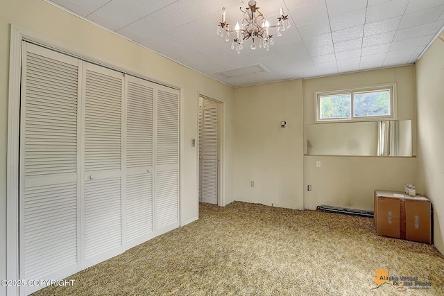 20811 Eagle River Rd, Eagle River, AK 99577 - unfurnished bedroom featuring carpet flooring and a chandelier