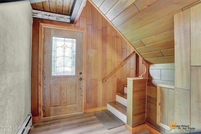 20811 Eagle River Rd, Eagle River, AK 99577 - entryway with wood finished floors, wood ceiling, vaulted ceiling, wood walls, and stairs