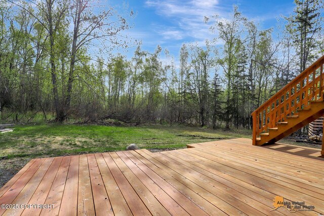 20811 Eagle River Rd, Eagle River, AK 99577 - wooden deck featuring stairway and a yard