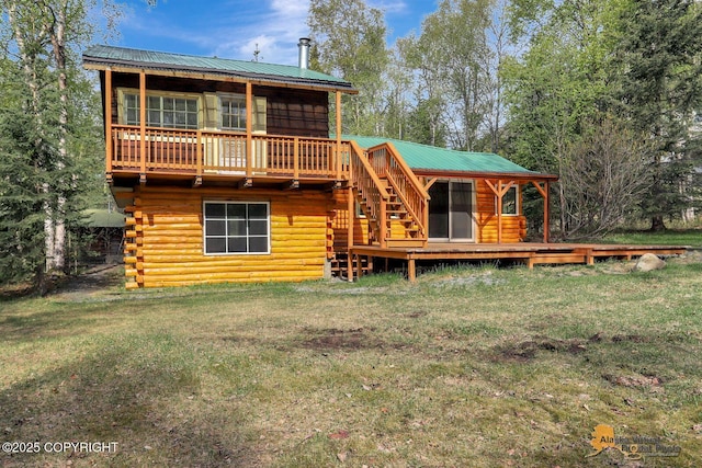 20811 Eagle River Rd, Eagle River, AK 99577 - rear view of property featuring a deck, stairs, log exterior, and a yard