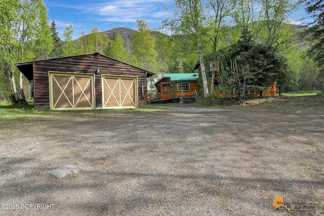 20811 Eagle River Rd, Eagle River, AK 99577 - view of outdoor structure featuring an outdoor structure and a mountain view