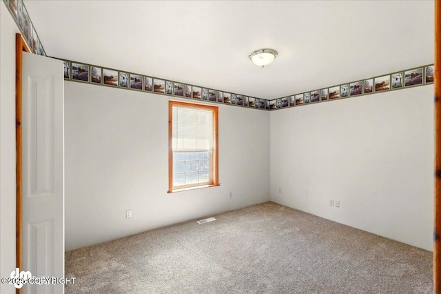 36115 Mackey Lake Rd, Soldotna, AK 99669 - unfurnished room with carpet flooring