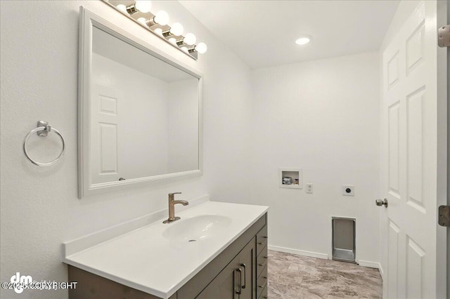 961 E Dellwood St, Wasilla, AK 99654 - bathroom featuring vanity and baseboards