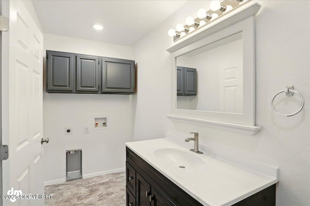 961 E Dellwood St, Wasilla, AK 99654 - bathroom with vanity and baseboards