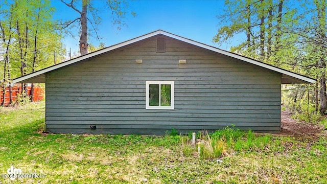 961 E Dellwood St, Wasilla, AK 99654 - view of property exterior with a lawn