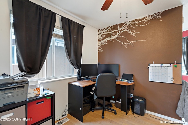 1957 Terrebonne Loop, Anchorage, AK 99502 - office featuring wood finished floors, ceiling fan, and an accent wall