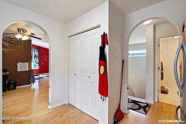 1957 Terrebonne Loop, Anchorage, AK 99502 - hall with light wood-style floors and arched walkways