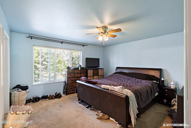 1957 Terrebonne Loop, Anchorage, AK 99502 - bedroom with carpet flooring and ceiling fan