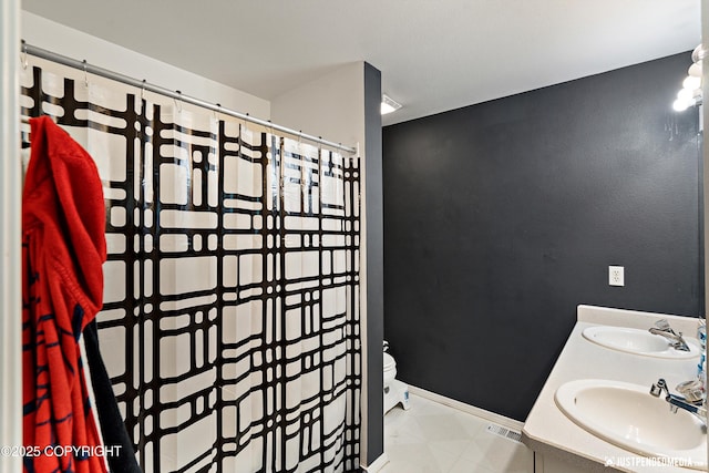 1957 Terrebonne Loop, Anchorage, AK 99502 - bathroom with double vanity and curtained shower