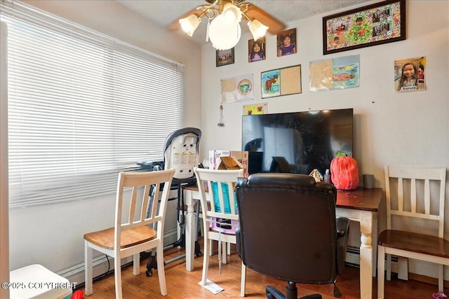 office area featuring ceiling fan and wood finished floors