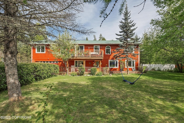 1061 E Agate Ln, Wasilla, AK 99654 - rear view of house featuring metal roof and a deck