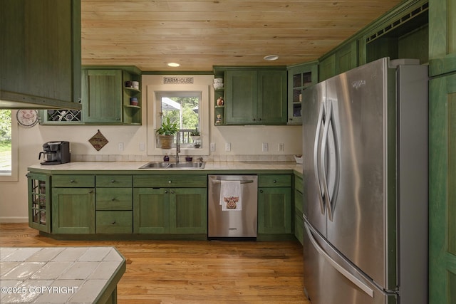 1061 E Agate Ln, Wasilla, AK 99654 - kitchen with green cabinets, stainless steel appliances, open shelves, wooden ceiling, and a sink