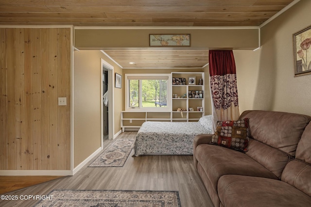 1061 E Agate Ln, Wasilla, AK 99654 - bedroom with wood ceiling, crown molding, wood finished floors, and baseboards