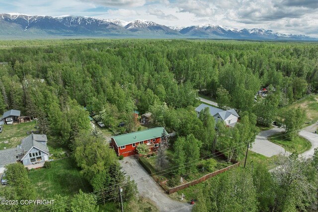 1061 E Agate Ln, Wasilla, AK 99654 - bird's eye view of a heavily wooded area and a mountain backdrop