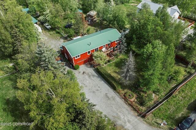 1061 E Agate Ln, Wasilla, AK 99654 - aerial view of property and surrounding area with a tree filled landscape