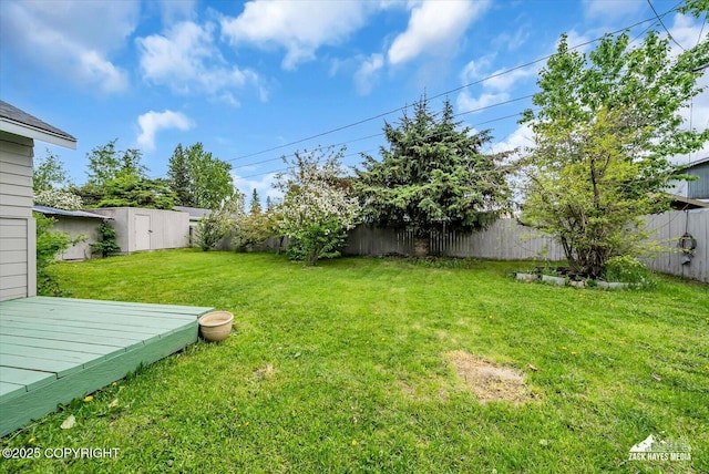 4313 Lois Dr, Anchorage, AK 99517 - view of yard with a wooden deck