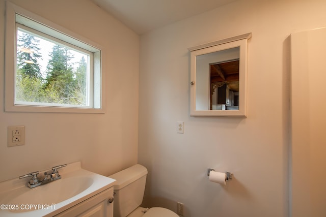 55851 Glenn Rd, Homer, AK 99603 - bathroom featuring toilet and vanity