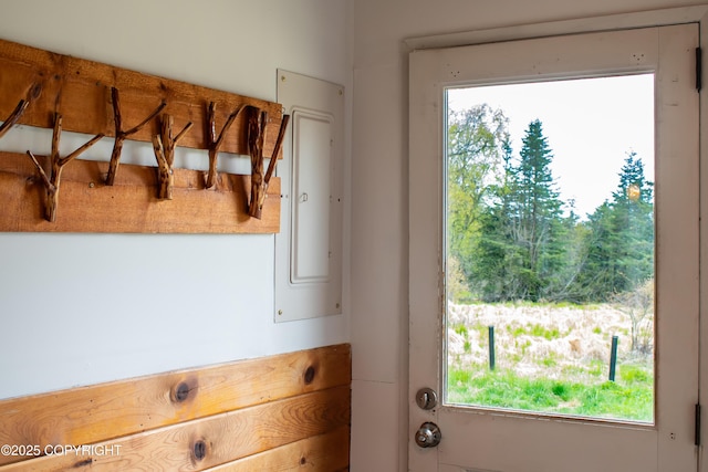 55851 Glenn Rd, Homer, AK 99603 - doorway to outside with electric panel and healthy amount of natural light