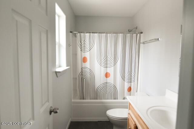 41485 Derks Lake Rd, Soldotna, AK 99669 - full bathroom with shower / bath combination with curtain, toilet, and vanity
