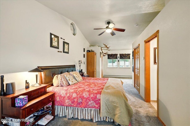 664 E Auklet Ave, Palmer, AK 99645 - carpeted bedroom featuring a baseboard heating unit, baseboards, and ceiling fan