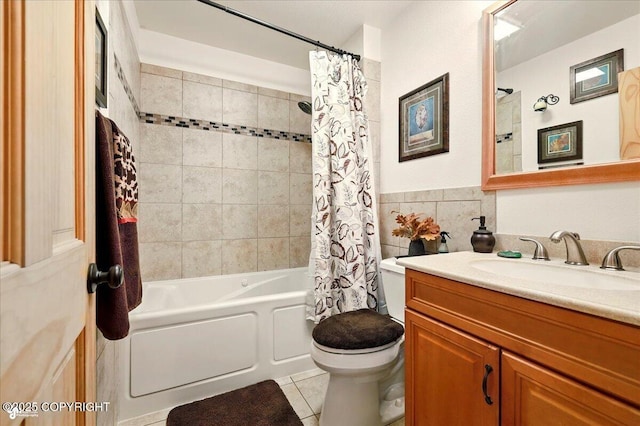 664 E Auklet Ave, Palmer, AK 99645 - bathroom with vanity, shower / bath combo with shower curtain, toilet, tile patterned flooring, and tile walls
